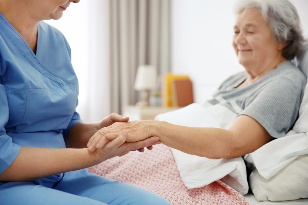 Nurse with elderly patient